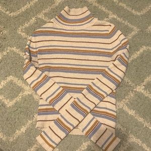 Turtle neck with blue, maroon, gold stripes